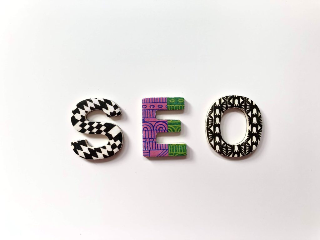 The letter "SEO" in bold, creative letters