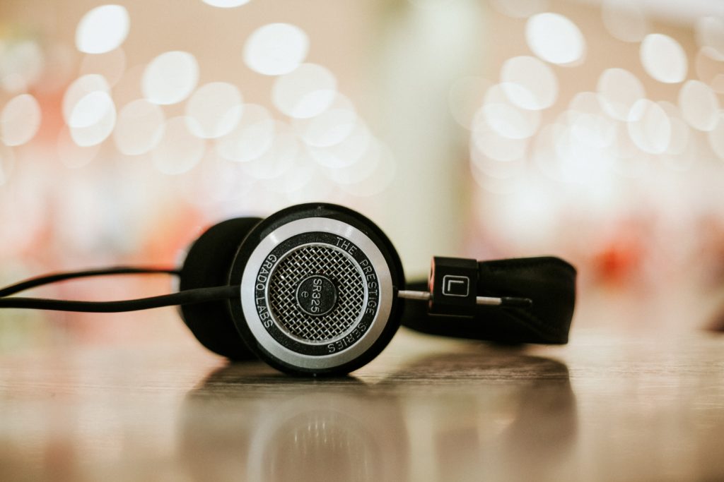 Black headphones with a glittering background