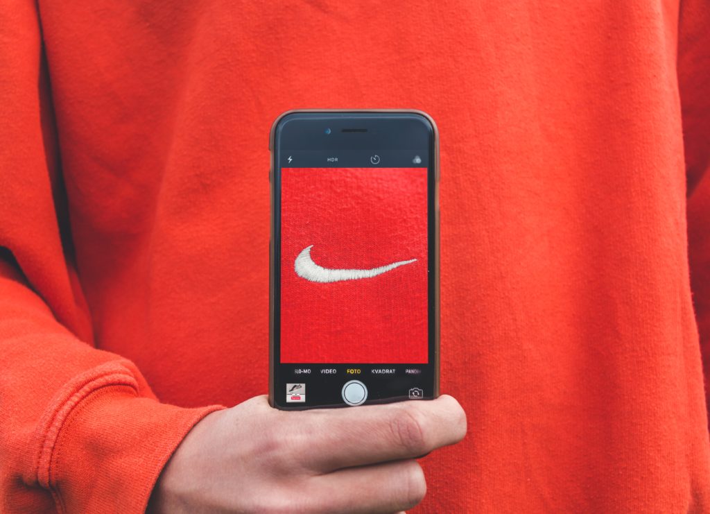 A cellphone with the Nike logo on it