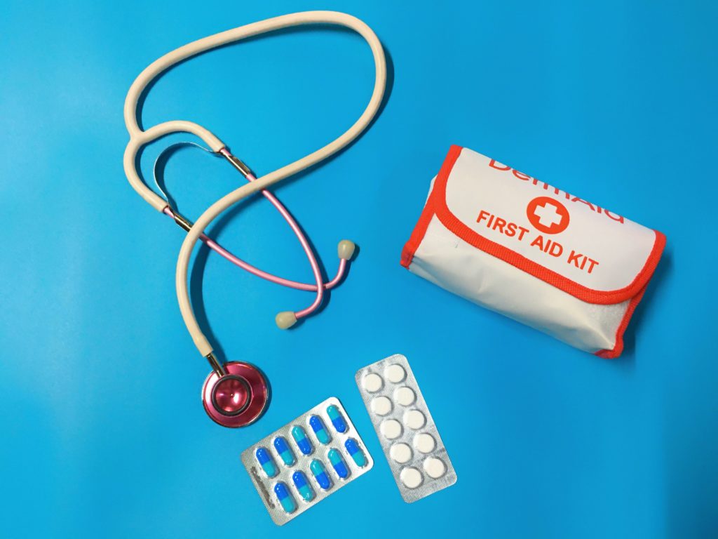 A stethoscope, First Aid kit and some tablets.