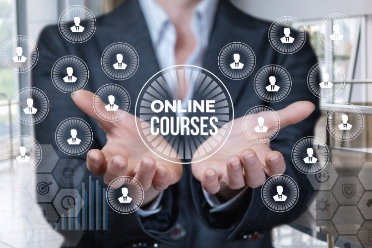 A person with open, outstretched hands with graphics with the words "online courses"