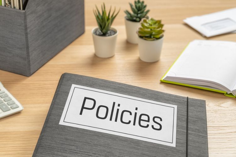 A file with the word "policies" on it.