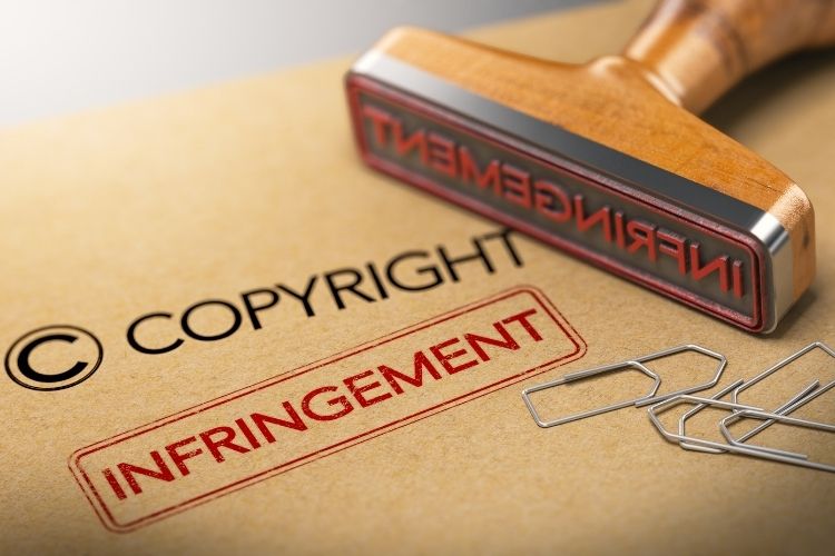 A file labelled "copyright" with a red stamp labelled "infringement".