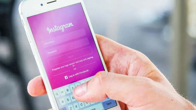 A cellphone with the login page of Instagram open.