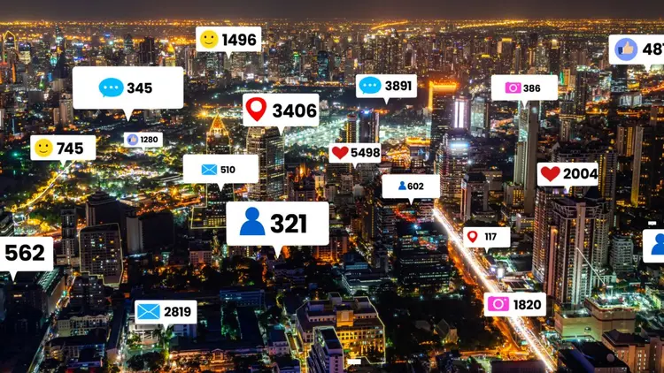 An image of a city with social media icons depicting social media engagement.