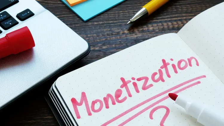 A notebook with the word "monetization" written in it.