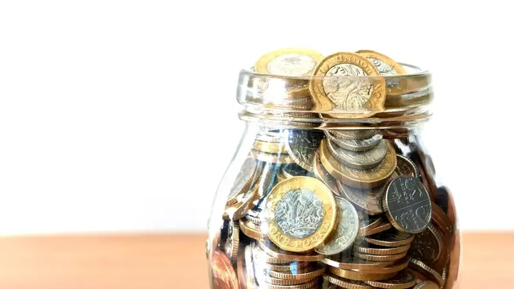 A jar full of coins.
