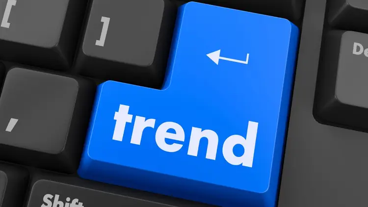 The "enter" key on a computer keyboard with the word "trend" on it instead.