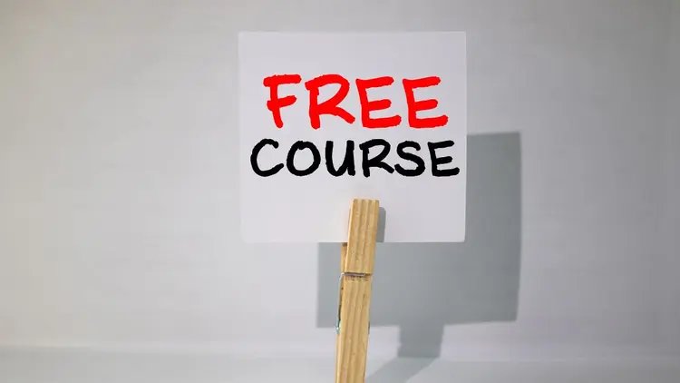 A note with the words "Free Course" on it. 
