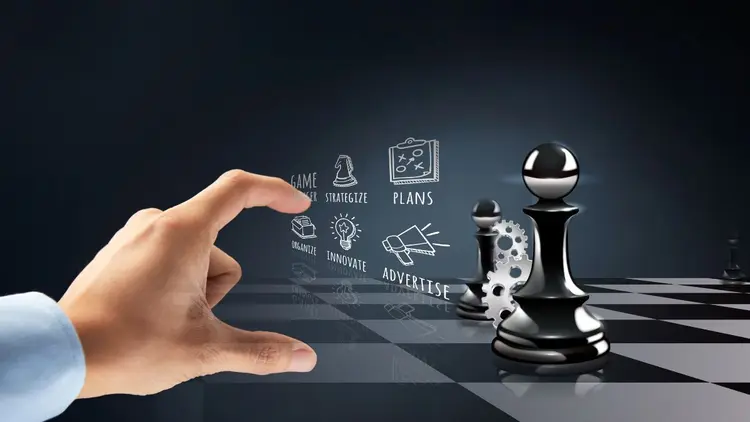 A chess player deciding what move to make, with graphics depicting decision making tools.