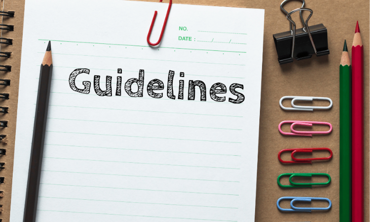 A notebook with the word "guidelines" on it.